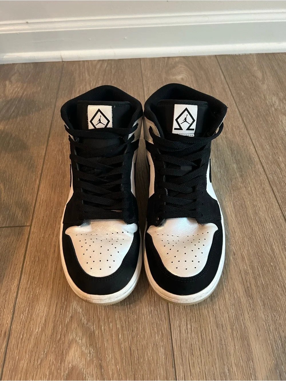 Nike Black and White Mid-Top Sneakers